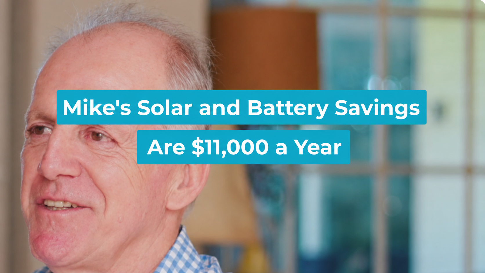 Mike Chapman, a Lenergy solar and battery customer from the Southern Highlands, smiling in his home.