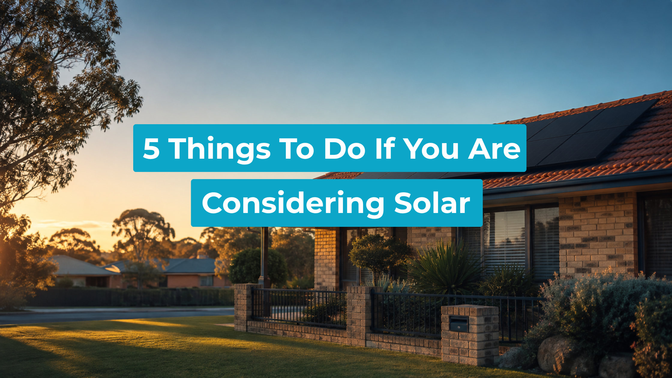 Rooftop solar panels on a suburban Australian brick home in late afternoon light.