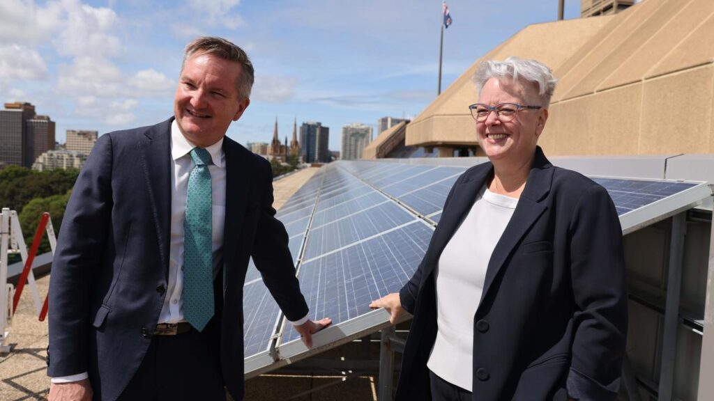Penny Sharpe and Chris Bowen Ministers of Energy standing in front of a solar system