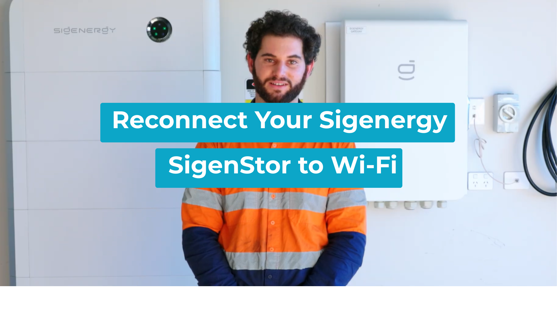 Lenergy technician Ziad standing in front of a SigenStor battery and gateway, featured image for the guide to reconnect the Sigenergy SigenStor to Wi-Fi.