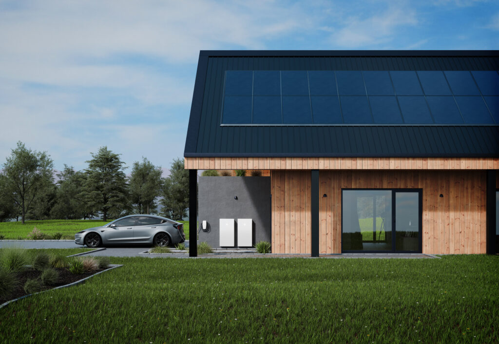 Tesla Powerwall 3 battery installed outside of home with solar panels on rooftop.