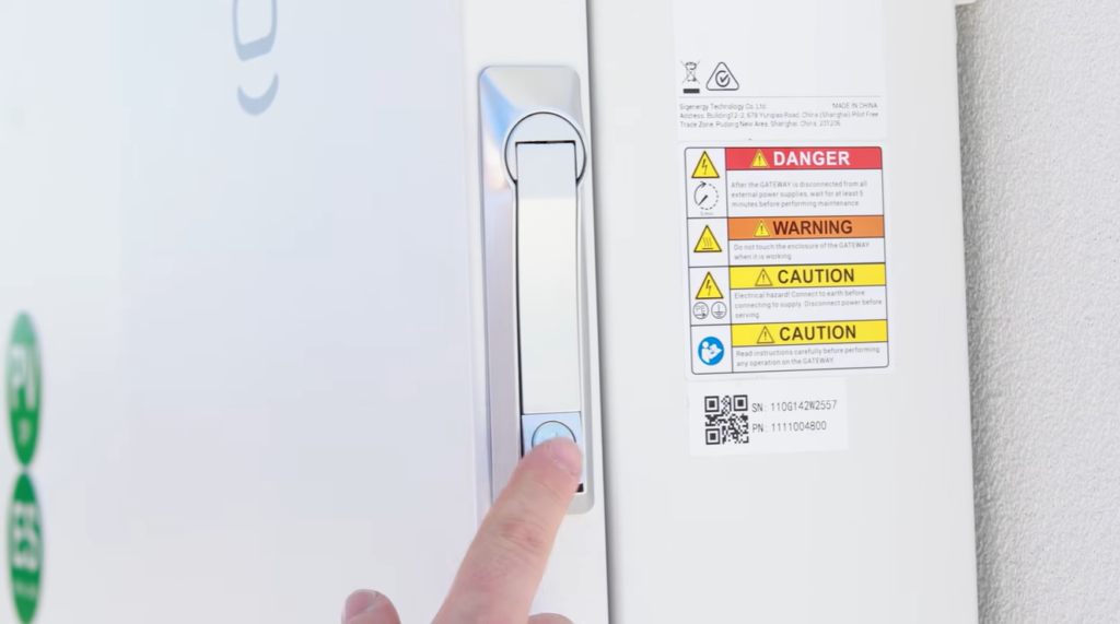 Opening the Sigenergy gateway to reach the inverter main switch when shutting down the SigenStor battery